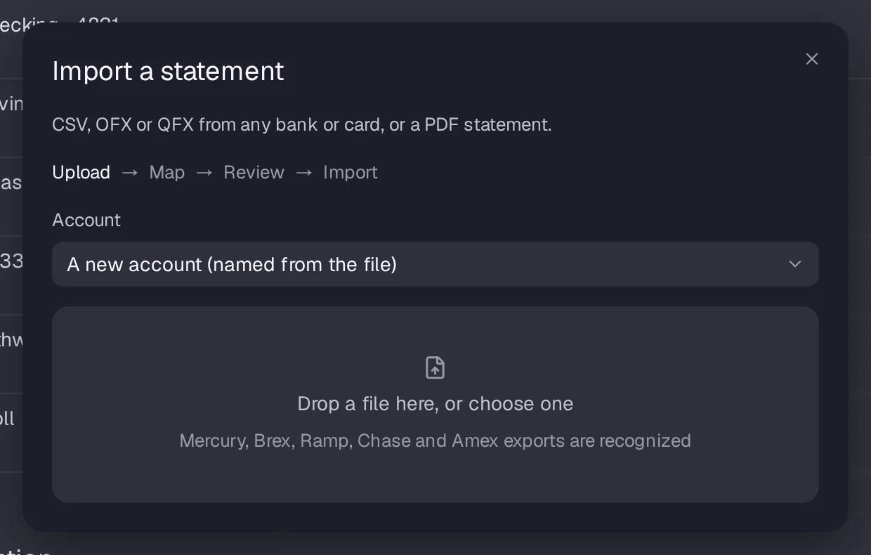 The Import a statement dialog, mapping a CSV's date, description and amount columns